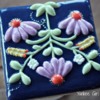Flower quilt cookie with corn syrup/vodka glaze: Cookie and Photo by Yankee Girl Yummies