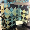 Mosaic Backsplash in Tower Room's Kitchenette: Mosaic by Marie Eliana; Cruddy Photo Courtesy of Julia's iPhone