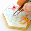 Placing Dewdrops on Colored Royal Icing: Cookie and Photo by Honeycat Cookies