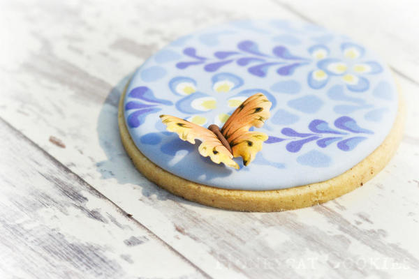 Butterfly and wisteria cookie close up