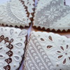 White Needlepoint Hearts: Cookies and Photo by by Natasha Rusak