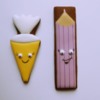 Faces on Cone and Pencil Cookies: Cookies and Photo by Laegwen