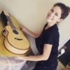 Rebecca with Her Life-size Guitar Cake: Photo Courtesy of Rebecca Hines
