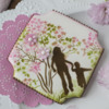 Another Mother and Child Cookie, Super Close-up: Cookie and Photo by Julia M Usher; Stencils Designed by Julia M Usher in Partnership with Confection Couture Stencils