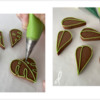 Steps 3c and 3d - Pipe Tiny Ovals in Monstera Leaves, and Outline Other Group of Leaves: Design, Cookies, and Photos by Manu