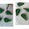 Steps 3g and 3h - Pipe Details on Leaves: Design, Cookies, and Photos by ManuU