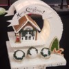 #5 - Gingerbread House on Lighted Stand: By Dixie Dust and Powdered Sugar