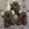 #8 - Knitted Valentine Koalas with Red Rose and Heart: By Isugarfy (aka swissophie)