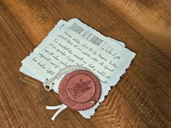 Medioeval Manuscript with Wax Seal by Dixie Dust and Powdered Sugar