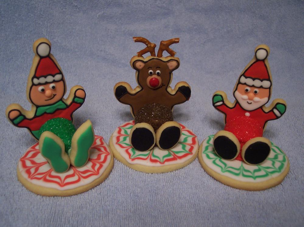Christmas elf, Santa, and reindeer