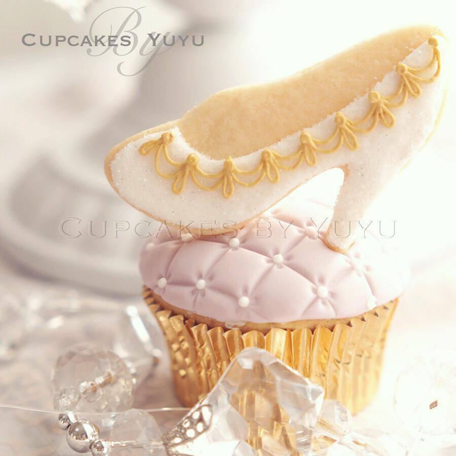 Glass slipper cookie on a cupcake