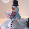 Snowman: Snowman reading T'was The Night Before Christmas Poem