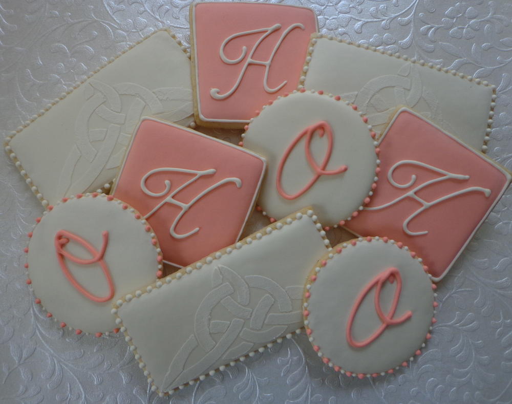 Wedding cookies in coral and cream