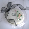 Fluted Floral Wedding Favor: packaged in clear deli container with snap-on lid, wire mesh bow spot glued to lid