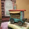 Parnassus on Wheels with book